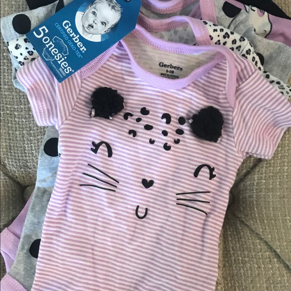 5 body suits- 2 new with tags, 3 like new